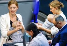Deputetja e Partisë së Gjelbër, Hanna Steinmüller në foltoren e Bundestagut me foshnjën që fle në kraharorin e saj